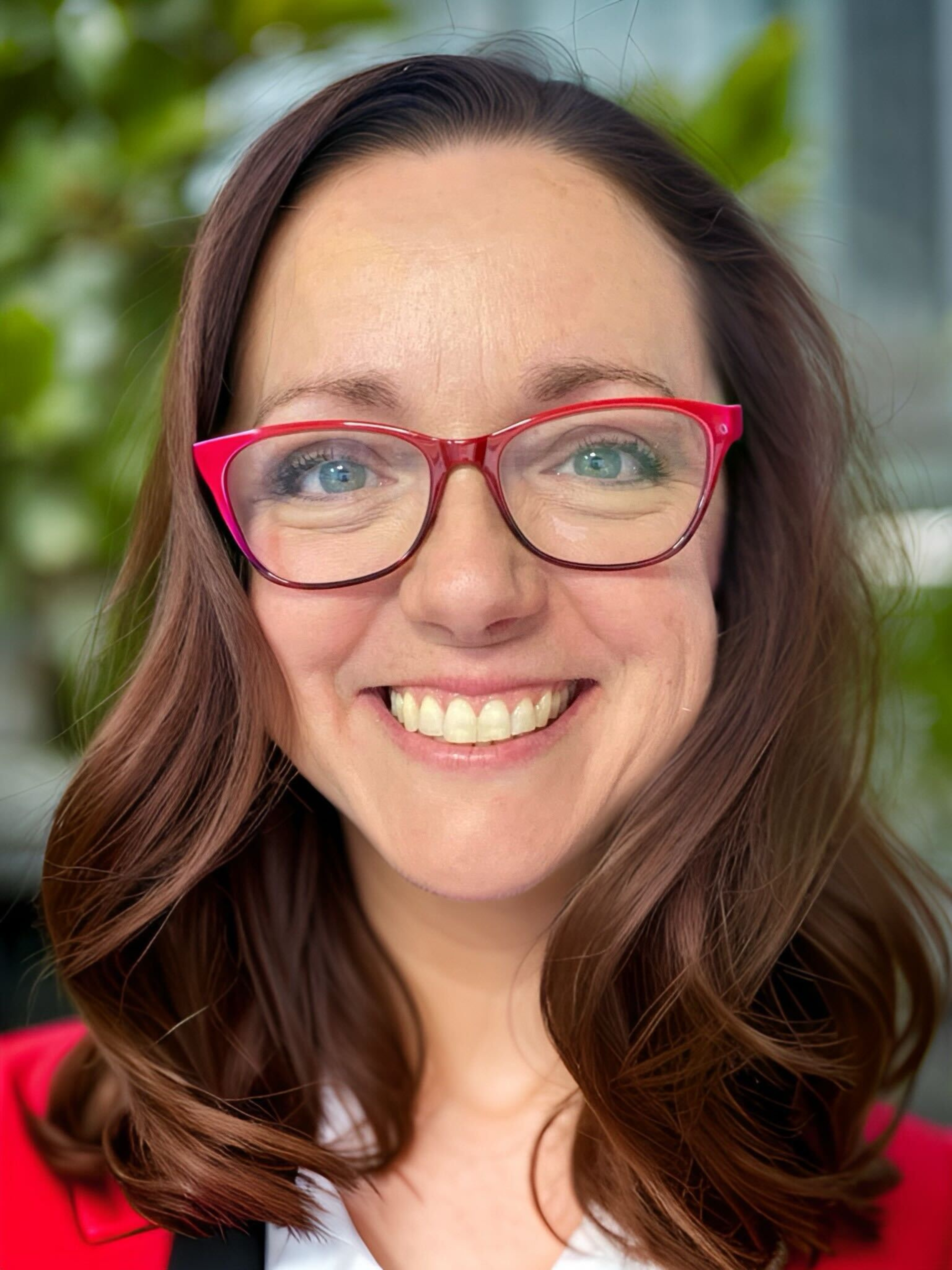 Smiling headshot of Theresa Benson.