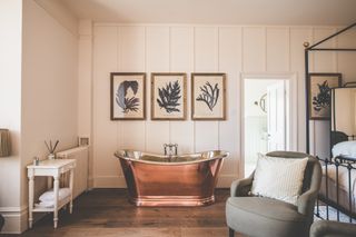 copper bath with nickel interior in traditional bedroom