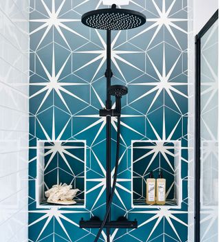bathroom with printed walls and shower