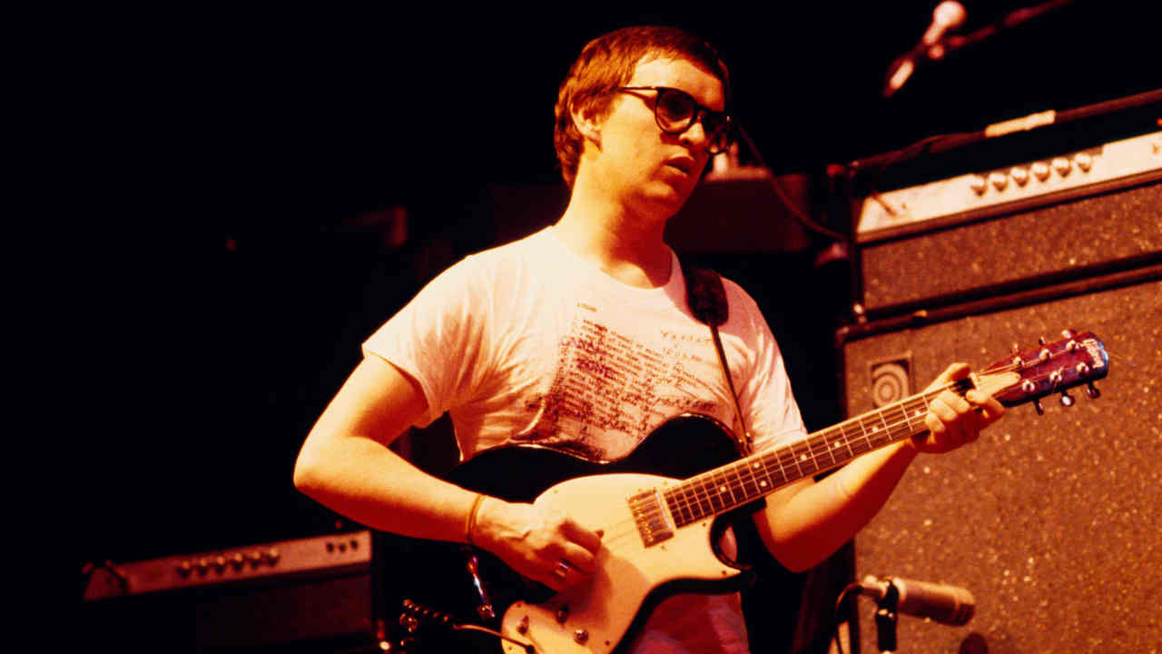Squeeze&amp;rsquo;s Chris Difford performing onstage in the 1980s