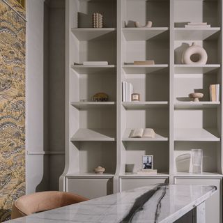A home office with custom storage niches