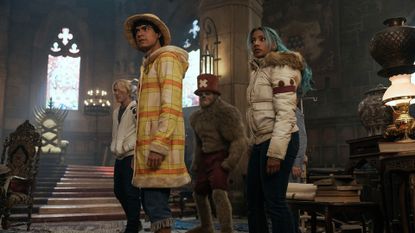 (L to R) Taz Skylar as Sanji, Iñaki Godoy as Monkey D. Luffy, Gavin Gomes as Tony Tony Chopper Heavy Point, Charithra Chandran as Miss Wednesday in season 2 of One Piece.