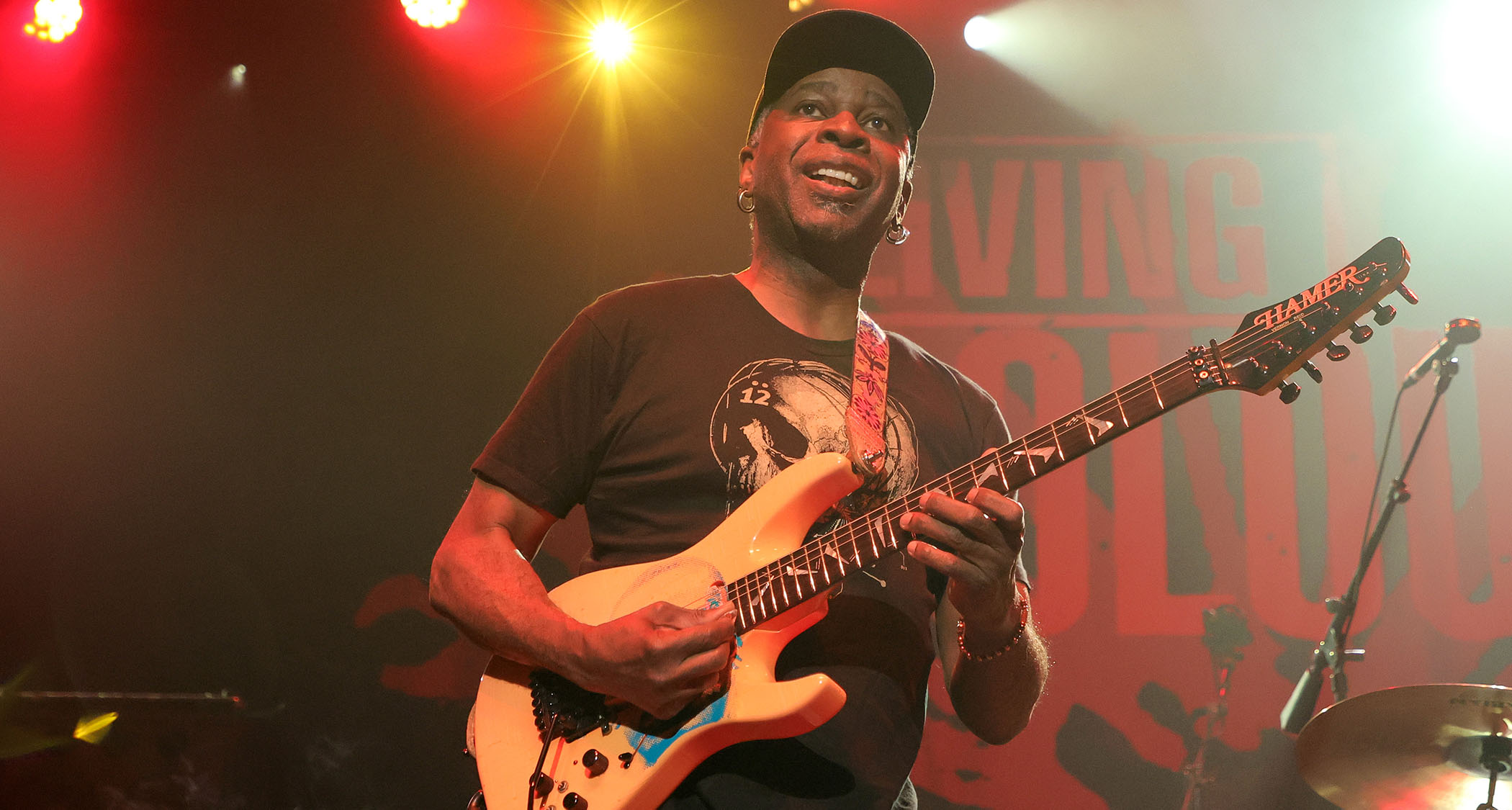 Vernon Reid of Living colour wears a ball-cap and plays his Harmmer S-style with the reverse headstock.