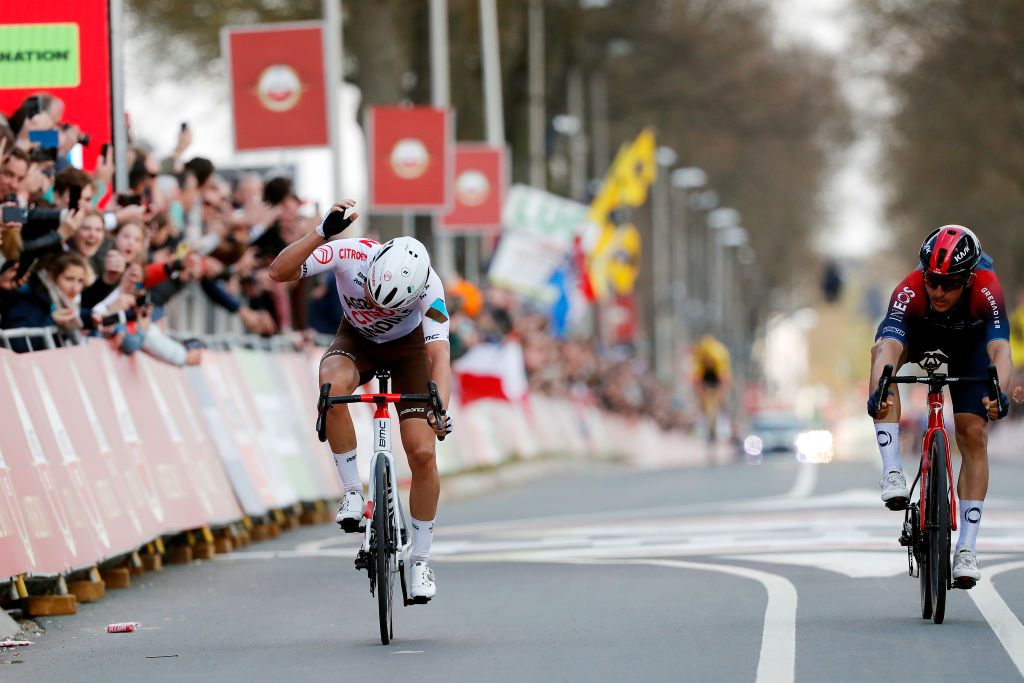 VALKENBURG NETHERLANDS APRIL 10 LR Michal Kwiatkowski of Poland and Team INEOS Grenadiers and Benoit Cosnefroy of France and AG2R Citren Team sprint to win during the 56th Amstel Gold Race 2022 Mens Elite a 2541km one day race from Maastricht to Valkenburg AGR2022 WorldTour on April 10 2022 in Valkenburg Netherlands Photo by Bas CzerwinskiGetty Images
