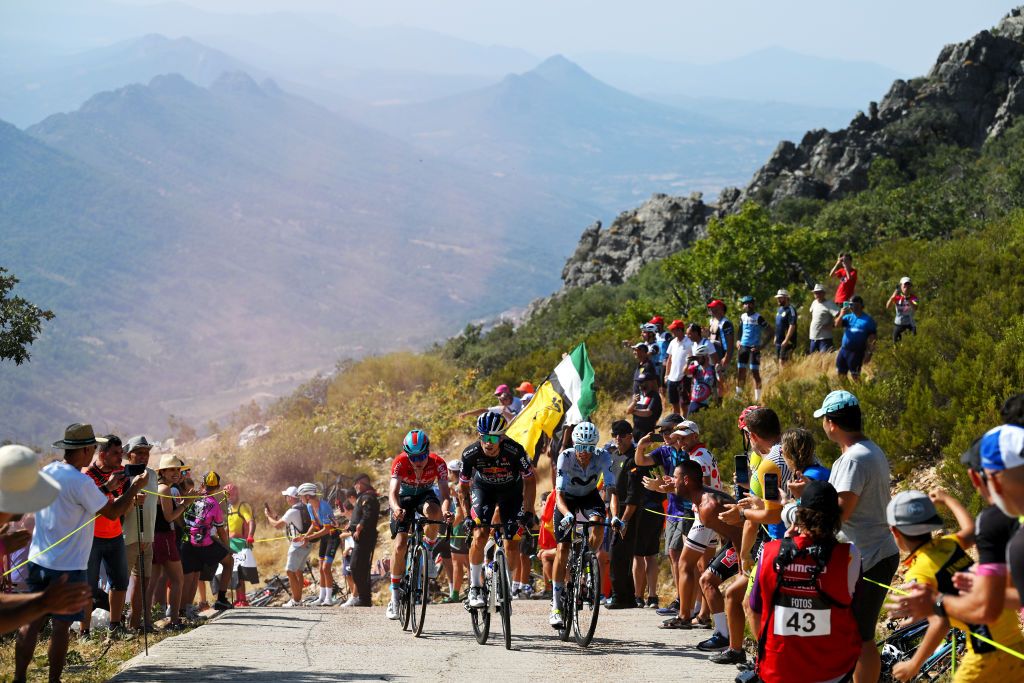 PICO VILLUERCAS SPAIN AUGUST 20 LR Lennert Van Eetvelt of Belgium and Team Lotto Dstny Enric Mas of Spain and Team Movistar and Primoz Roglic of Slovenia and Team Red Bull Bora hansgrohe compete in the breakaway during the La Vuelta 79th Tour of Spain 2024 Stage 4 a 1705km stage from Plasencia to Pico Villuercas 1544m UCIWT on August 20 2024 in Pico Villuercas Spain Photo by Tim de WaeleGetty Images