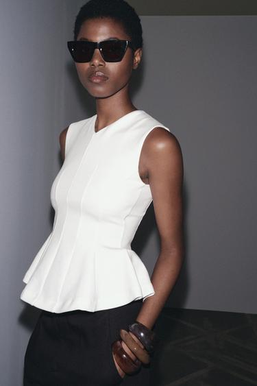 Sleeveless Interlock Peplum Top