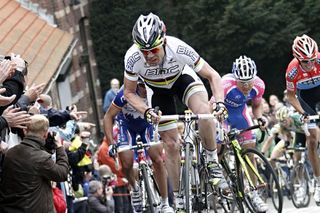 World Champion Cadel Evans (BMC) goes for it