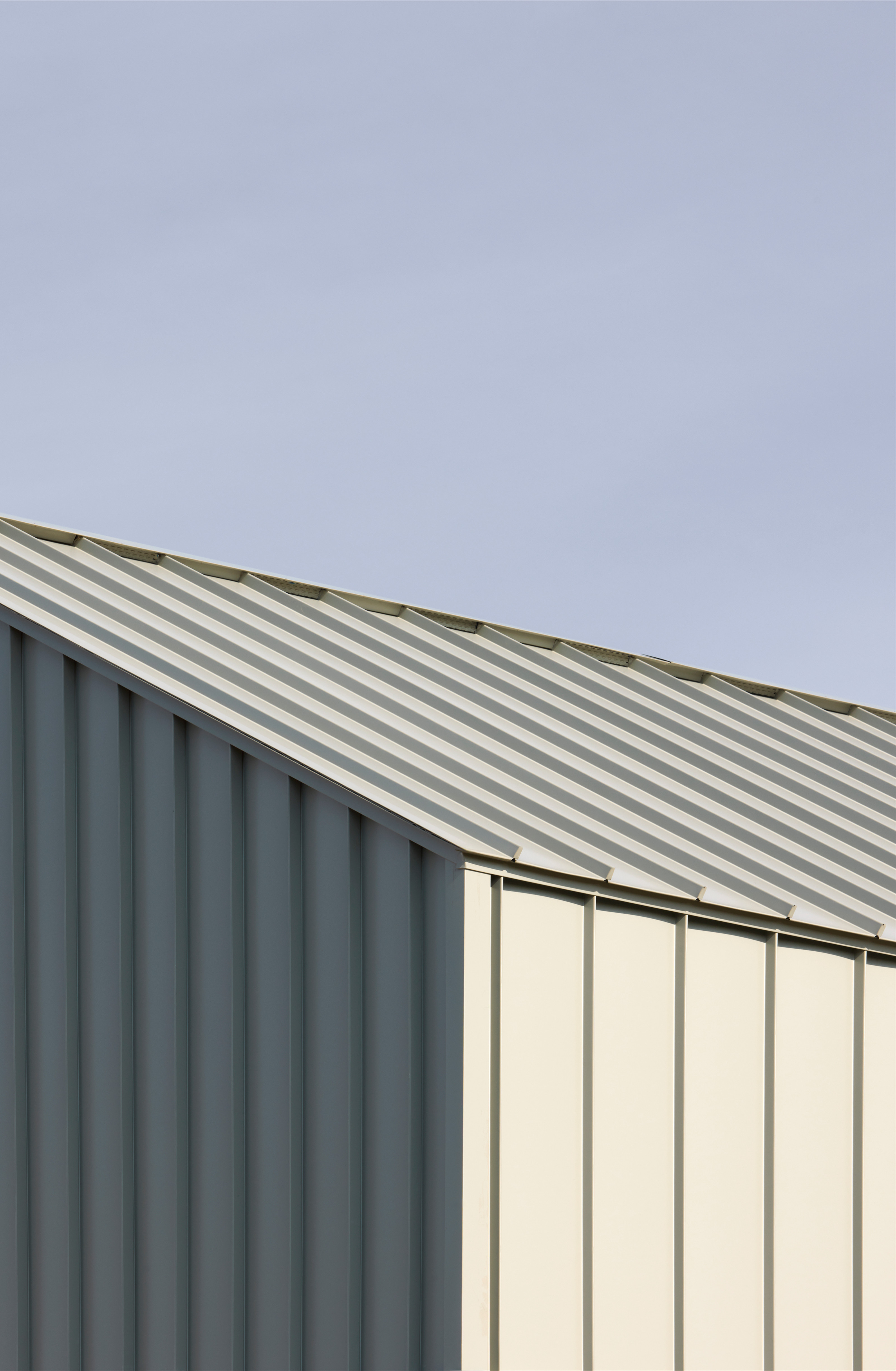 The detailing of the metal seamed roof is minimal and precise
