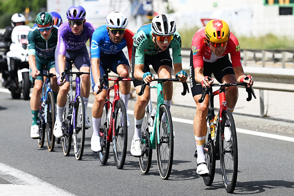 FONT-ROMEU, FRANCE - AUGUST 24: (L-R) Olivier Le Gac of France and Team Groupama - FDJ United, Mats Wenzel of Luxembourg and Team Equipo Kern Pharma and Magnus Cort of Denmark and Team Uno-X Mobility compete in the breakaway the La Vuelta - 81st Tour of Spain 2026, Stage 3 a 174km from Gruissan - Aude to Font Romeu 1941m / #UCIWT / on August 24, 2026 in Font Romeu - Aude, France. (Photo by Tim de Waele/Getty Images)