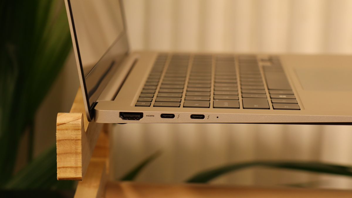 Samsung Galaxy Book3 on a wooden stand