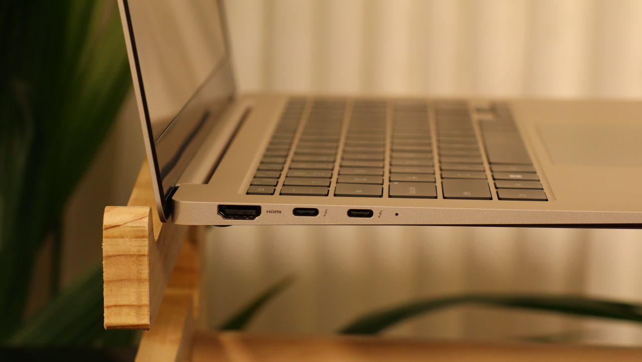 Samsung Galaxy Book3 on a wooden stand