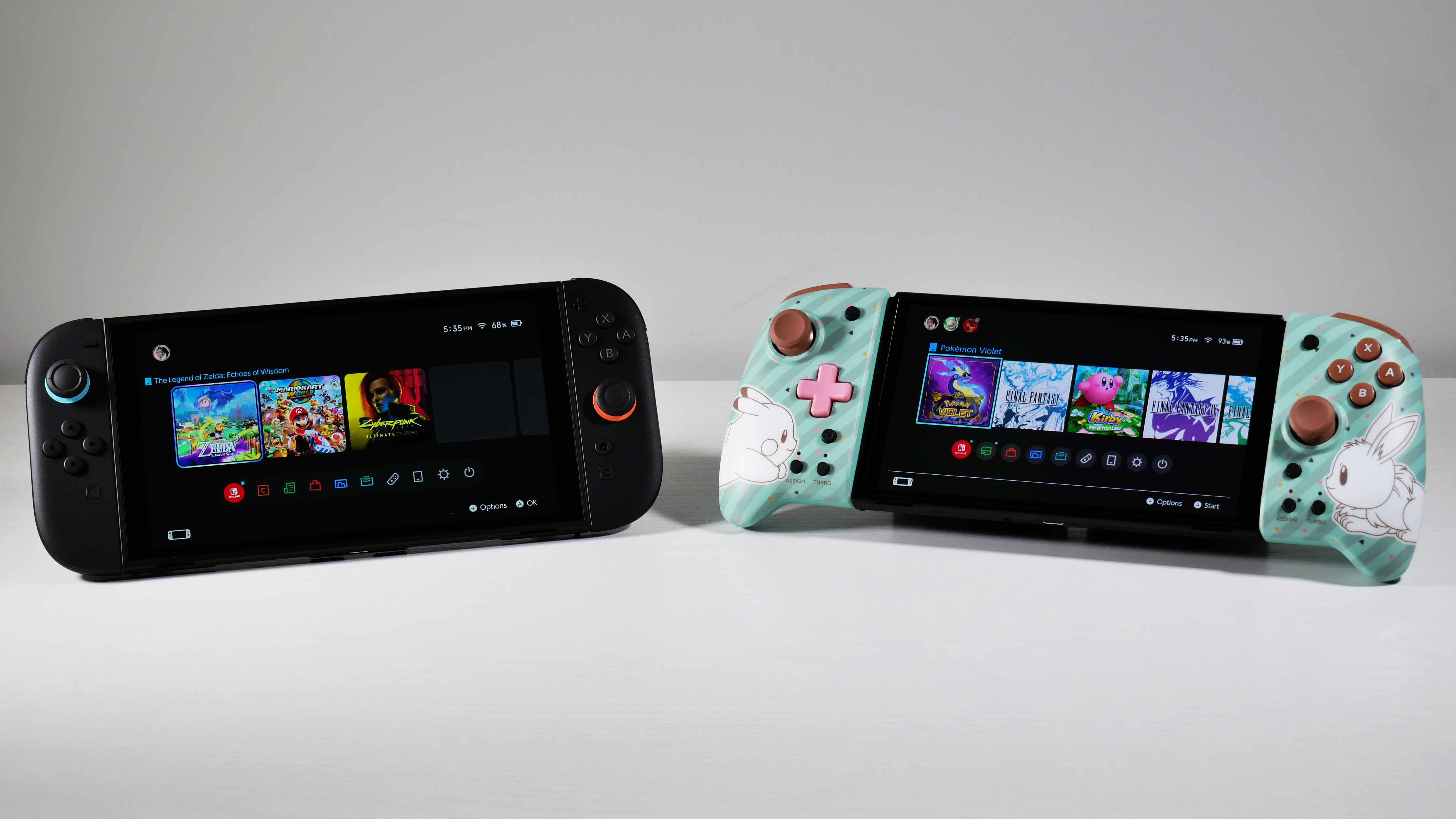 Nintendo Switch 2 and Switch OLED side by side, highlighting the Switch OLED's Hori Split Pad Pro.