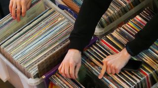 Cyber Monday vinyl deals: People sifting through crates of vinyl records