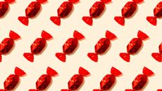 Quality Street--Pattern of rows of red wrapped candies