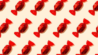 Quality Street--Pattern of rows of red wrapped candies
