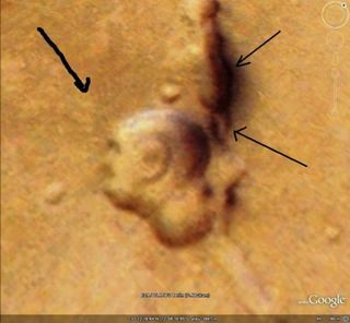 A Martian surface feature that one man says looks like the profile of Mahatma Gandhi.