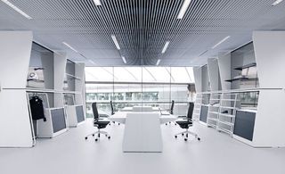 office work stations in the adidas HQ with storage set behind each station