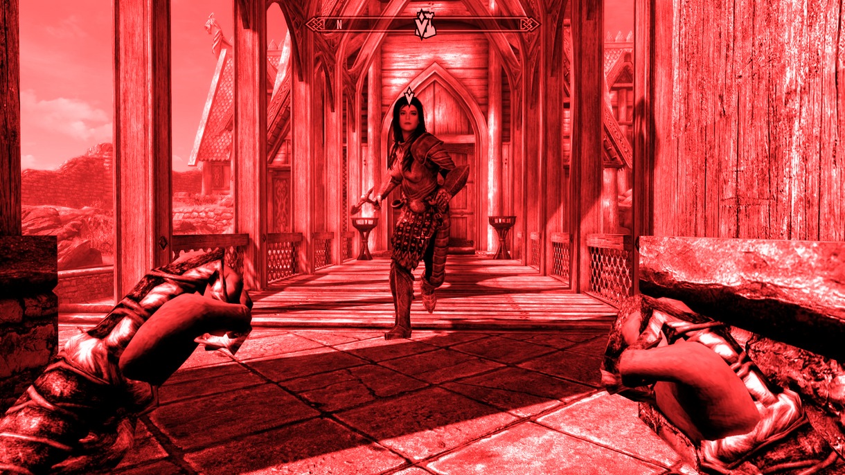 Atlana, a half-giantess companion, in Skyrim's Whiterun. The picture is tinted red.