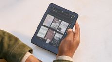 Amazon Kindle Colorsoft showing the new Dark Mode running on screen