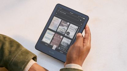 Amazon Kindle Colorsoft showing the new Dark Mode running on screen