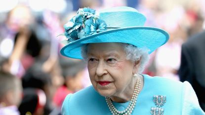 Queen Elizabeth II and Prince Philip, Duke of Edinburgh arrive at Mayflower Primary School during an official visit to Tower Hamlets on June 15, 2017 in London, England