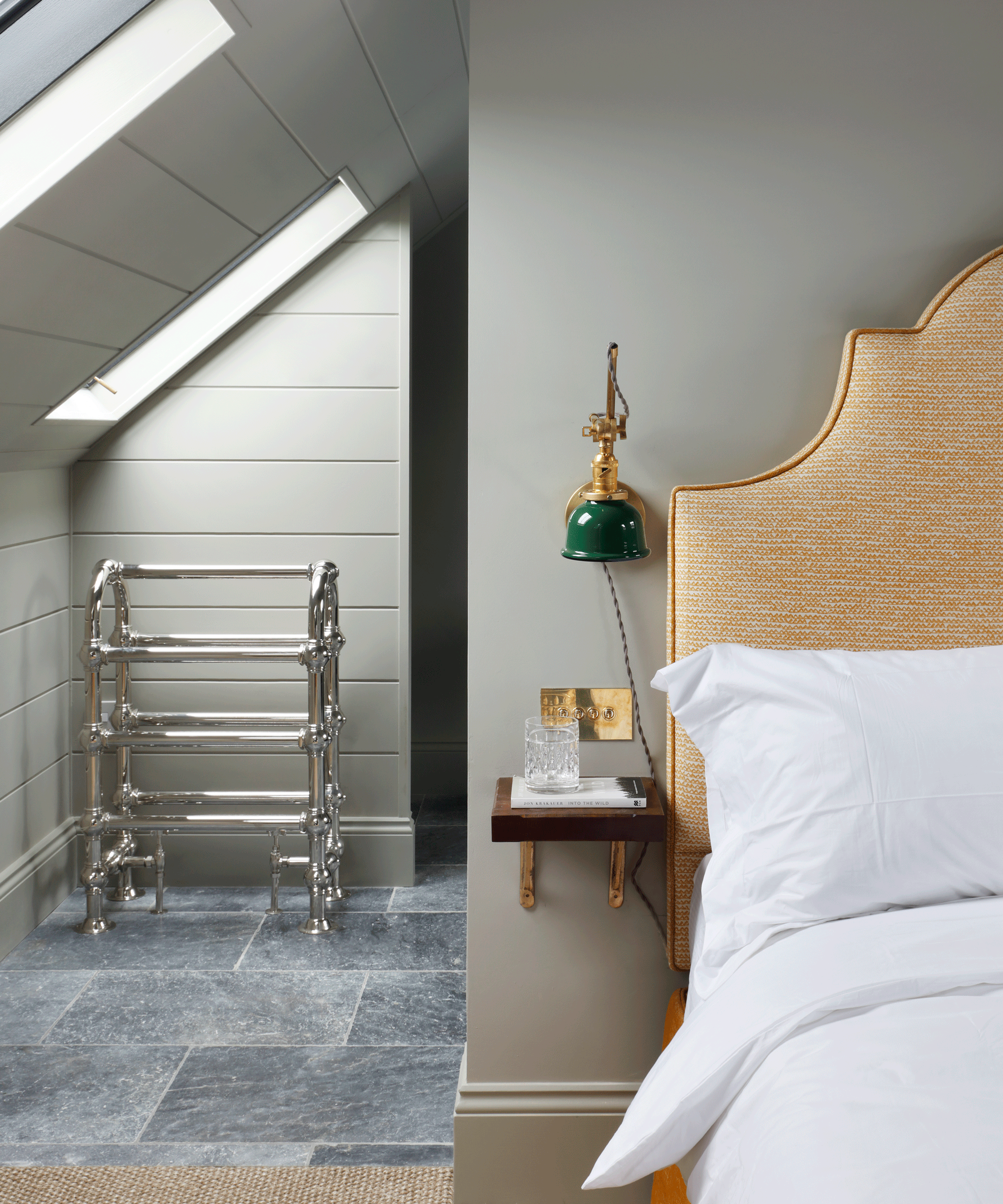 Bed in attic room painted Pigeon by Farrow & Ball