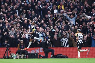 Joelinton of Newcastle United celebrates scoring his team's second goal during the Premier League match between Nottingham Forest FC and Newcastle United FC at City Ground on November 10, 2024 in Nottingham, England.