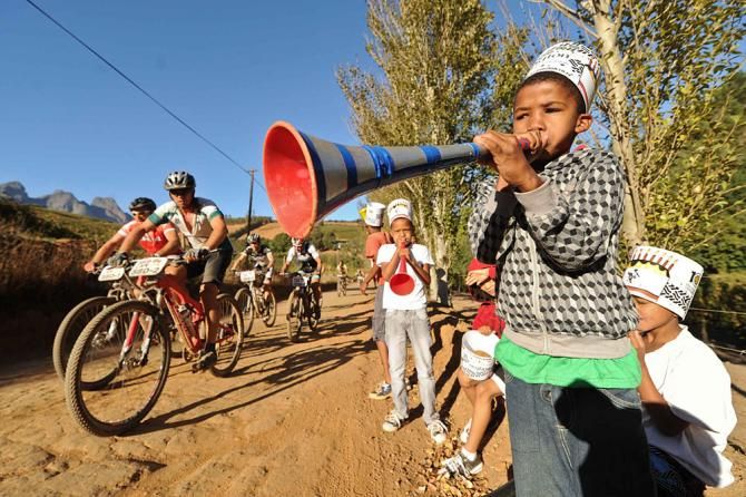 Local kids support riders during stage 5