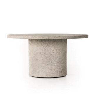 A round, outdoor coffee table