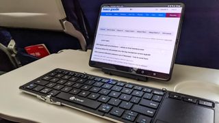 Samsung Galaxy Z Fold 3 being used a laptop with a Bluetooth keyboard.