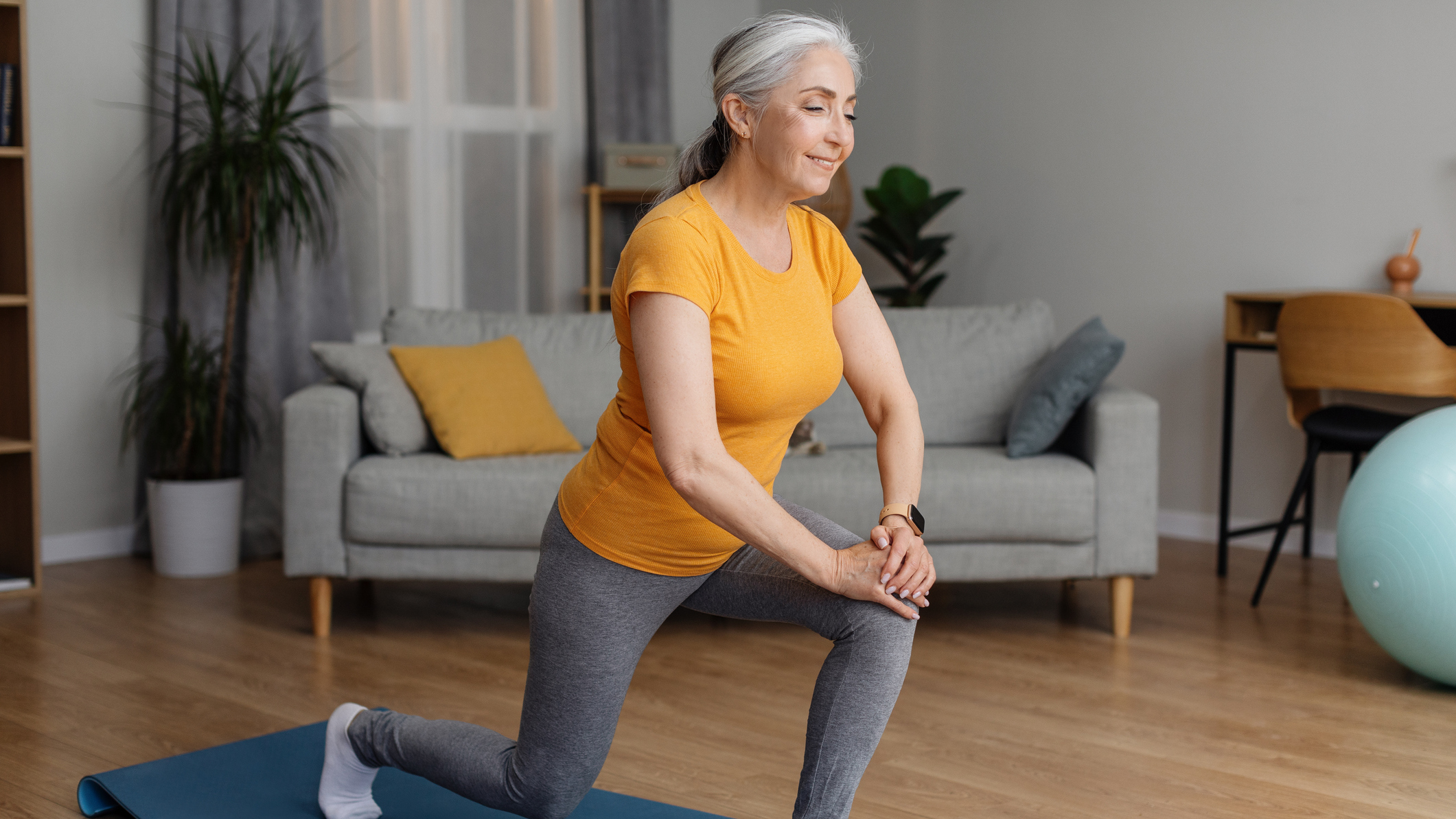 Woman performing lunge exercise at home