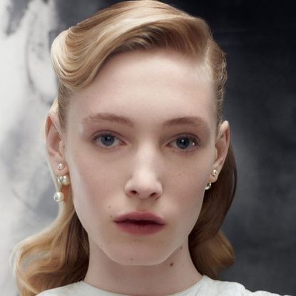 model with stained lip backstage at the Dior Women’s Fall 2024 Women’s Show