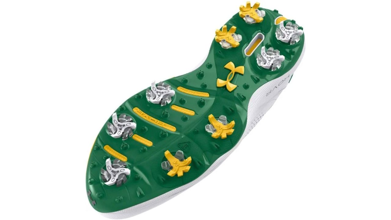 The sole of the Under Armour UA Drive Pro Patrons Golf Shoes on a white background