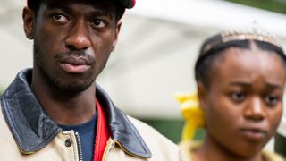 Jorden Myrie as Carl, Bukky Bakray as Dione in The Strays.