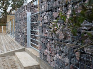 stone gabions used for front garden wall ideas