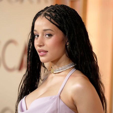 Chase Infiniti at the 2026 Oscars wearing a lilac dress and matching lilac eyeshadow