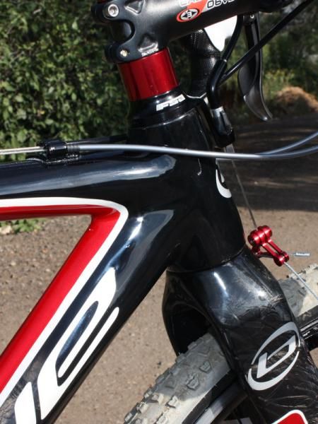 A tapered front end makes for rock-solid braking performance and precise handling under load but the head tube is very short