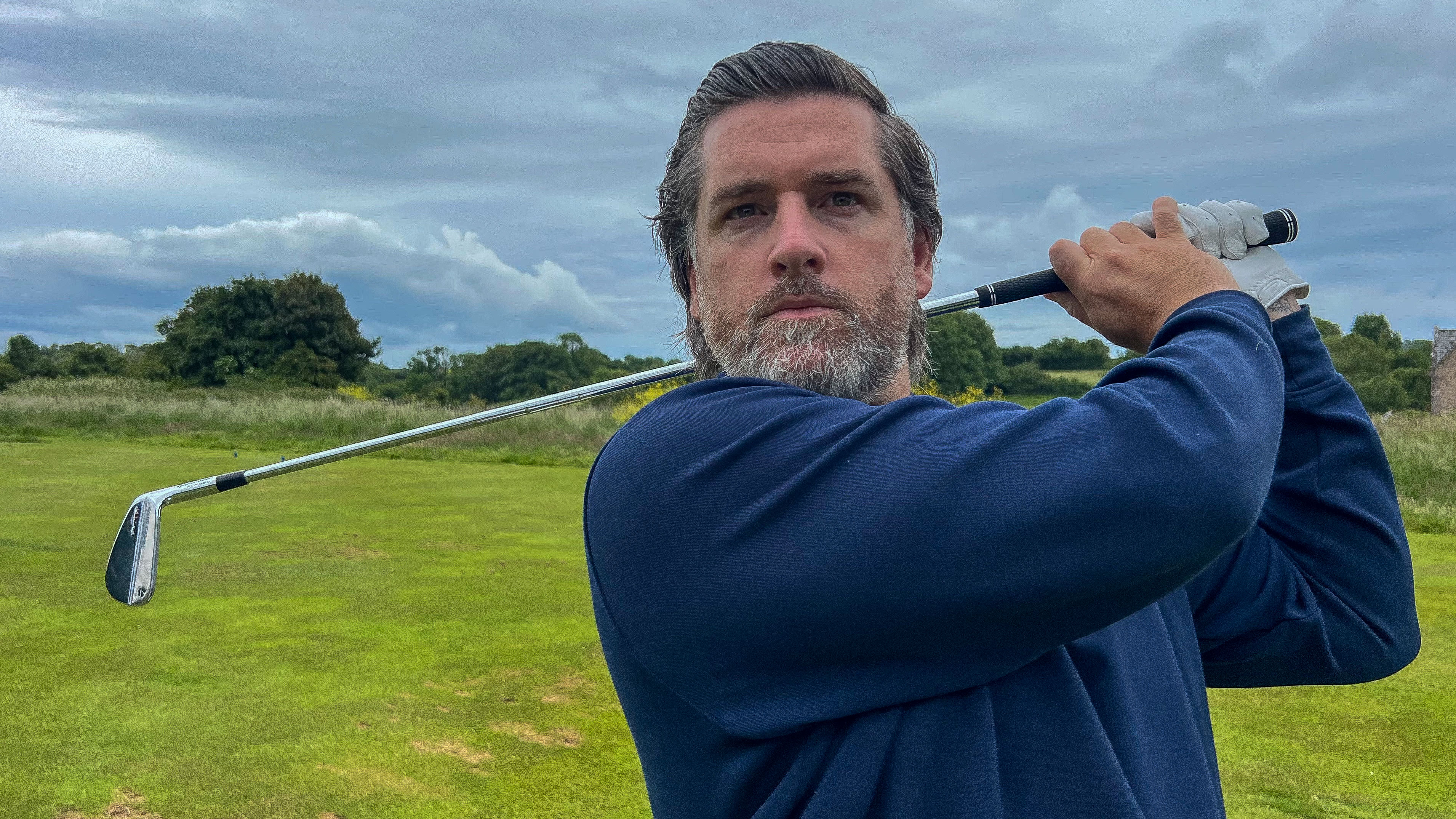 Photo of Joe Ferguson testing the TaylorMade P7TW iron