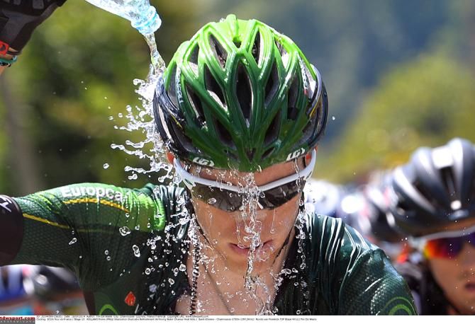 Pierre Rolland (Europcar) tries to cool off on a blistering hot day in the Alps