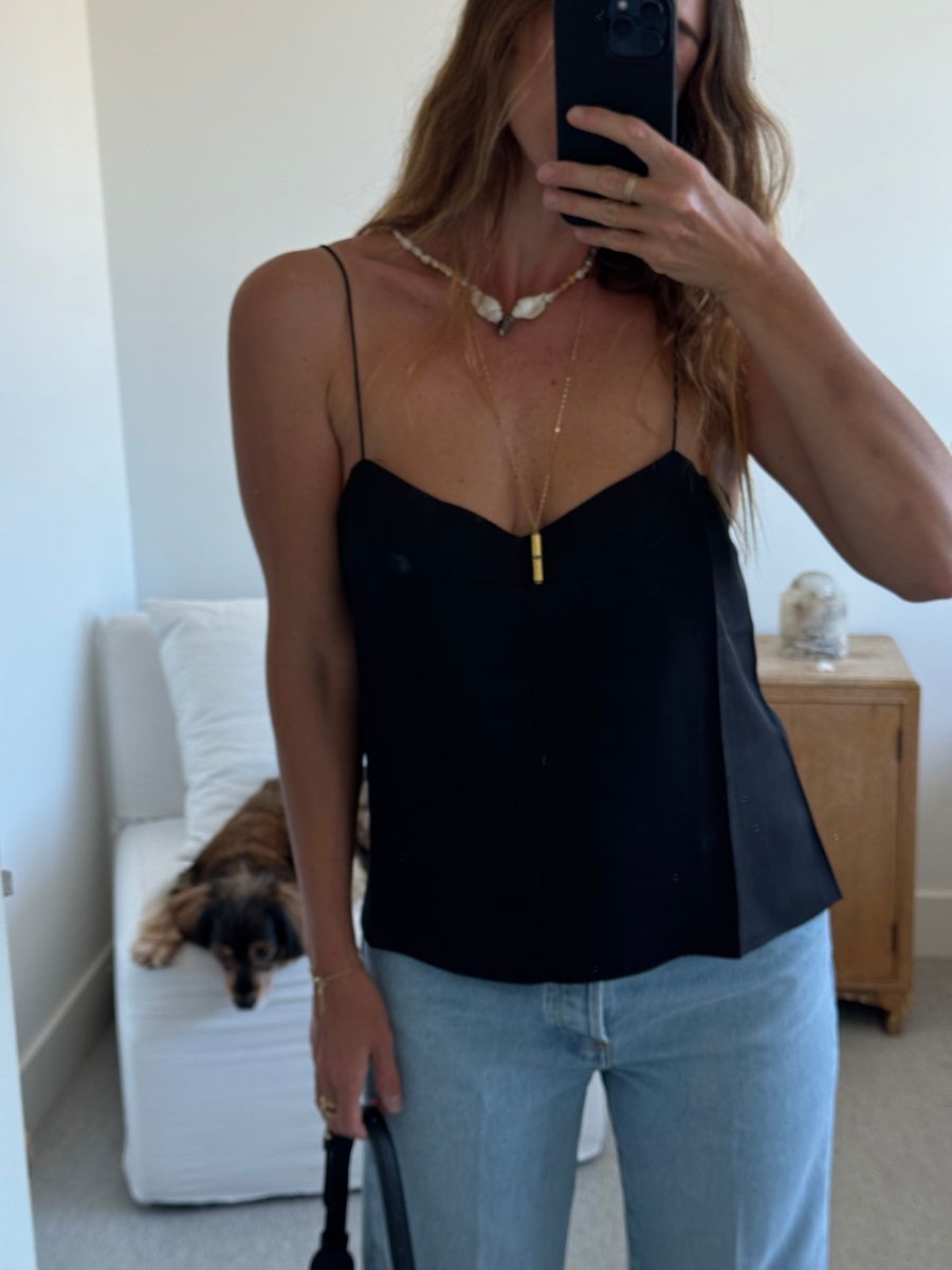 Angie wears a silk-twill camisole from St. Agni.