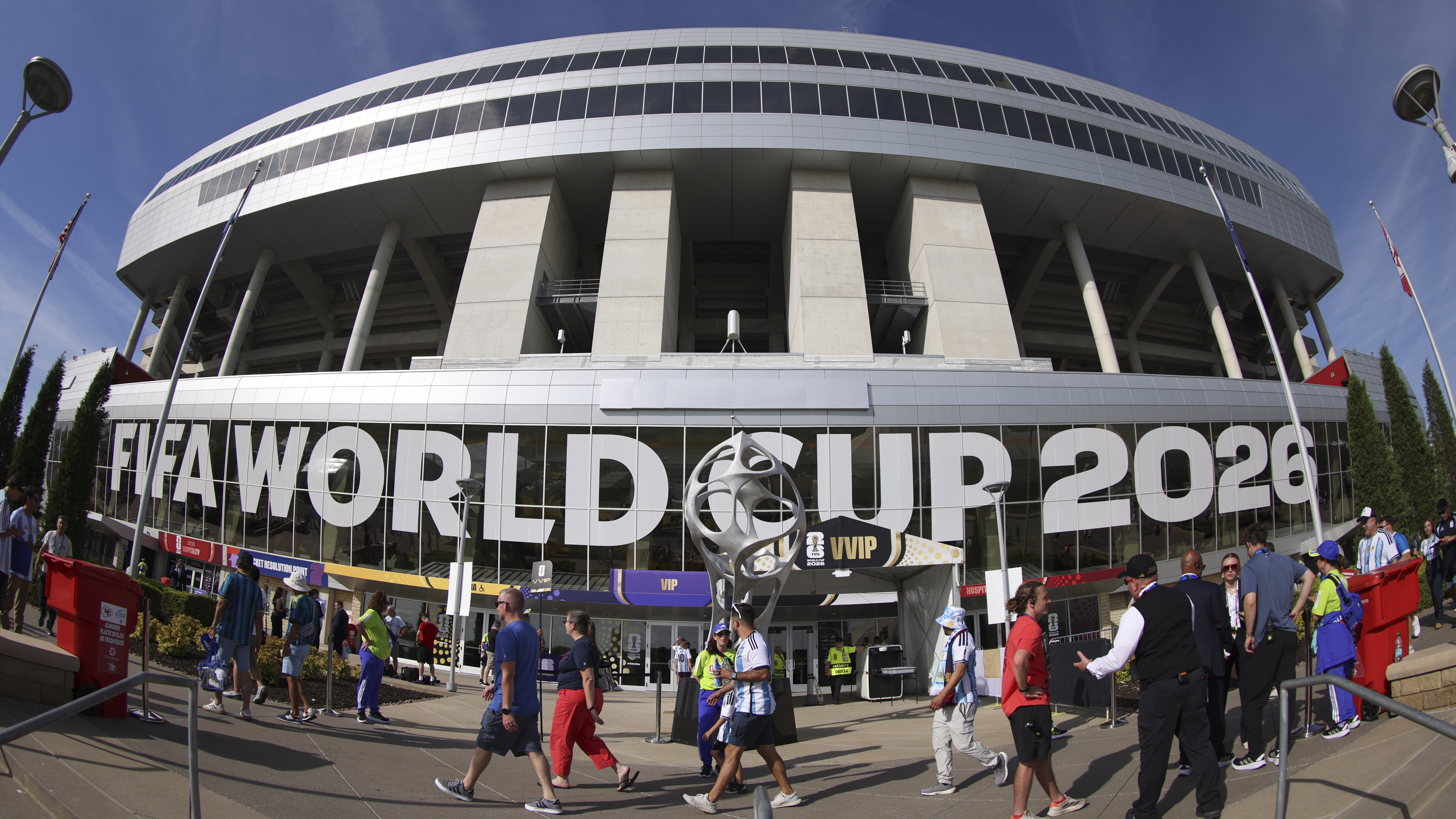 The outside of a World Cup 2026 stadium with people walking past