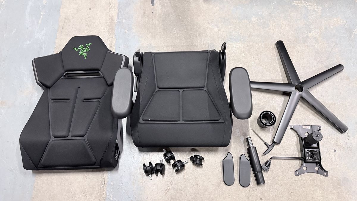 The Razer Soma Chroma's components laid out on a concrete floor