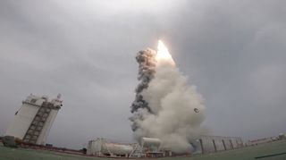 China's Long March 11 rocket lifts off from a mobile launch platform in the Yellow Sea on June 5.