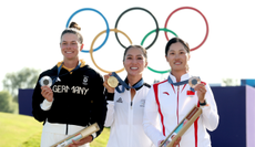 Esther Henseleit, Lydia Ko and Lin hold their medals on the podium