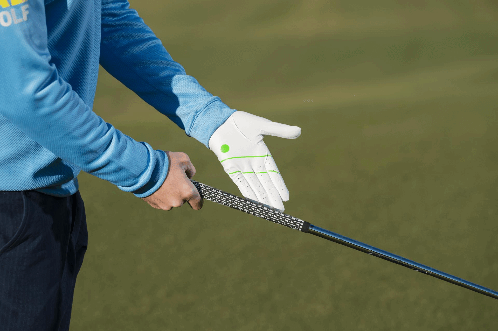 A GIF of Alex Elliott demonstrating the perfect golf grip, showing each step slowly to allow the viewer to visually see the progression from start to finish