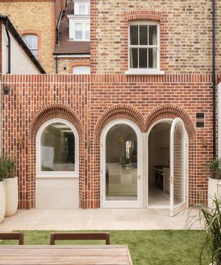 Arched windows and doors on a London terrace extension