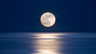 Moonrise over sea. Stock photo Seattle, San Juan islands giant moonrise over Salish sea