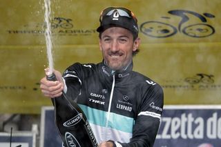 Stage winner Fabian Cancellara lets loose with the champagne.