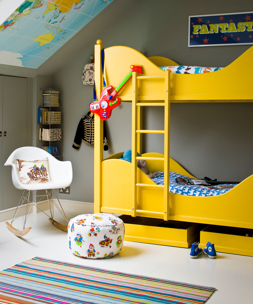 yellow bunk bed in grey kids room