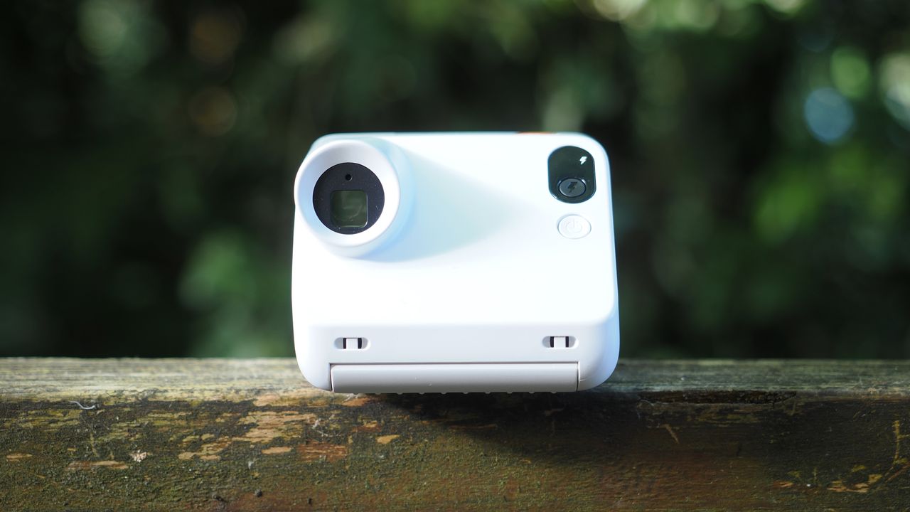 Polaroid Go Gen 3 on a wooden surface outdoors